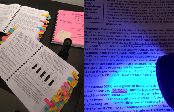 Printed and bound copies of CDC budget proposals, tabbed with sticky notes; censored words are written in invisible ink and visible using a blacklight